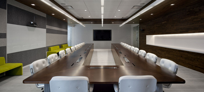 retractable monitors in adobe meeting room