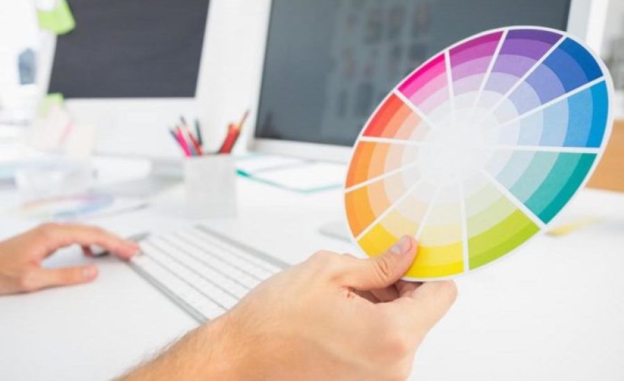 person-holding-color-wheel-e1504174983668